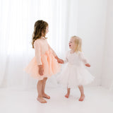 Two Girld Wearing The Astrid Fower Girl Dress