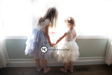 Two Girls Wearing Flower Girl Dresses