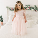 Girl Wearing The Sienna Flower Girl Dress - Blush Pink