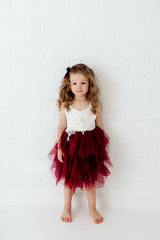 Girl Wearing Burgundy Flower Girl Dress
