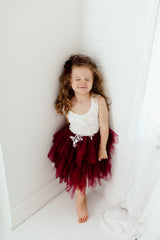 Girl Wearing Burgundy Flower Girl Dress