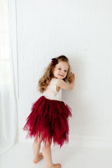 Girl Wearing Burgundy Flower Girl Dress