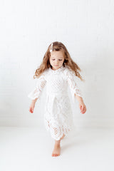 Girl Wearing White Lace Flower Girl Dress