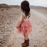 Girl Wearing Flower Girl Dress And Cowboy Shoes